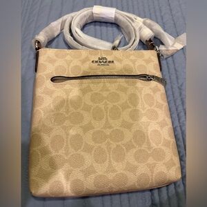 Brand new coach Mini Rowan file bag